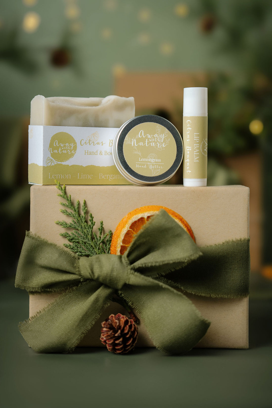 The Little Ritual Christmas gift set in Citrus: Citrus Burst hand and body bar, Lemongrass hand butter and Citrus Bouquet lip balm by Away with Nature