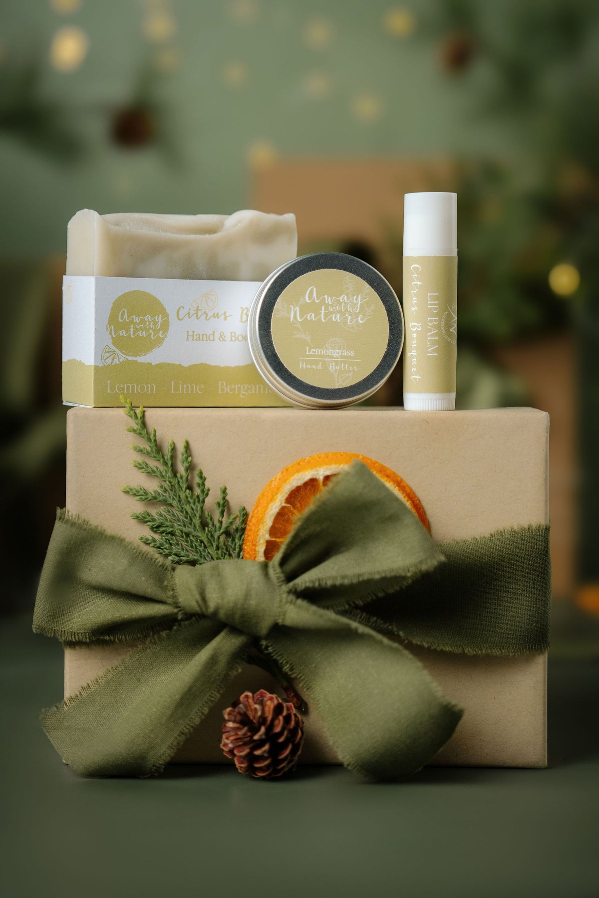 The Little Ritual Christmas gift set in Citrus: Citrus Burst hand and body bar, Lemongrass hand butter and Citrus Bouquet lip balm by Away with Nature